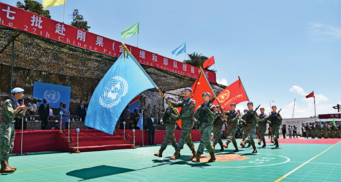 高舉人類命運共同體旗幟 推動世界走向光明前景